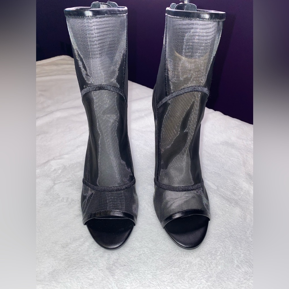 Brand new. Black mesh peep toe booties.